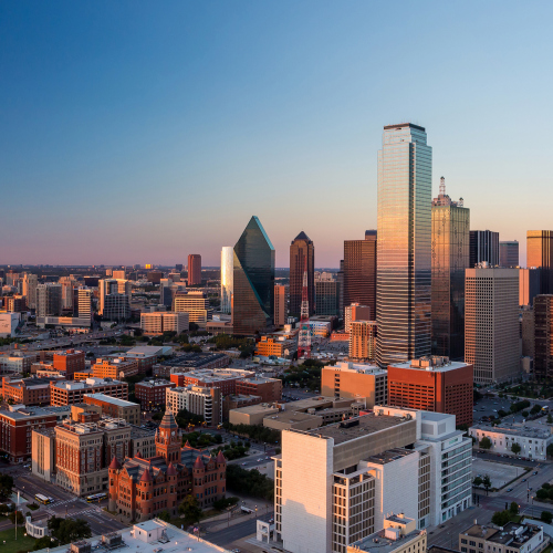 Dallas, Texas cityscape with blue sky at sunset, Texas