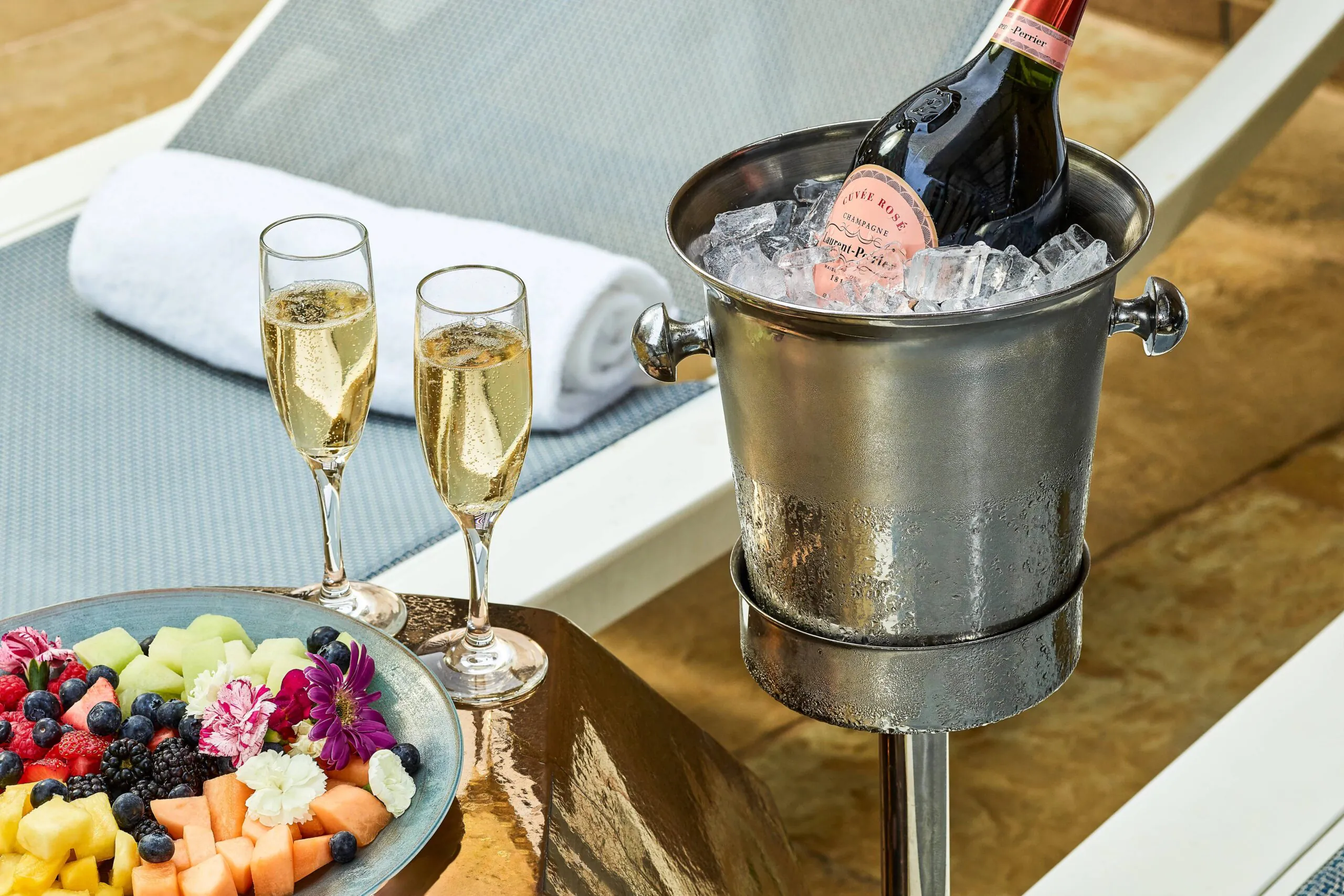 poolside service with food amenity and champagne